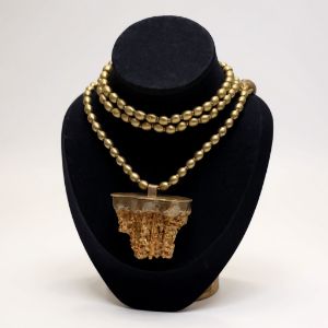 Brass necklace with petrified coral